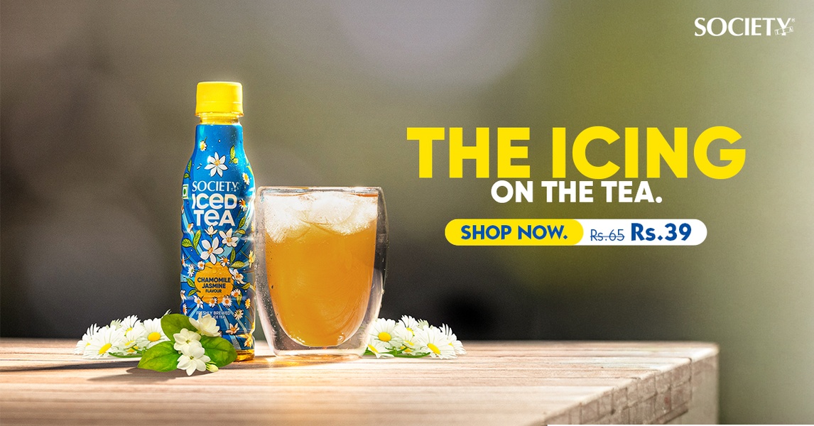 A high-quality studio product shot featuring a chilled iced tea bottle and a glass of tea with ice, styled with fresh jasmine and chamomile flowers, highlighting a price reduction.