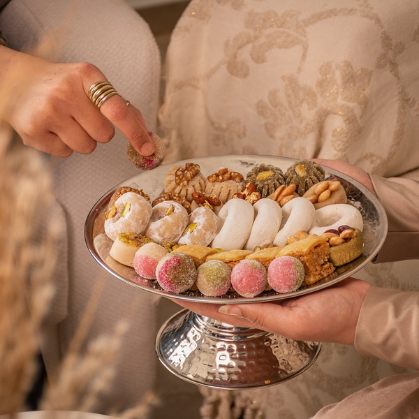 assorted cookies, middle eastern sweets, bakery tray, gourmet pastries, dessert platter, bestseller push, lifestyle, calm, warm, neutral, brown