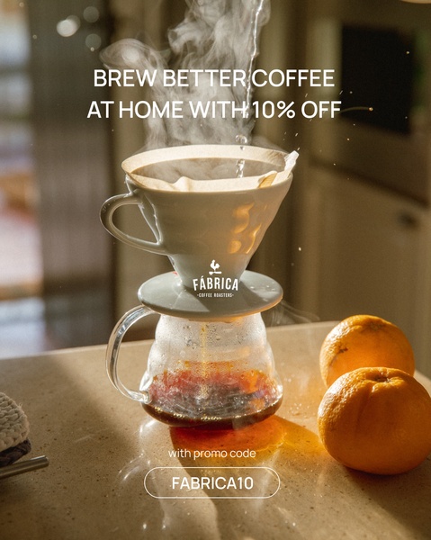 This creative showcases a coffee pour over brewing process in a cozy kitchen setting, combined with a clear promotional offer.