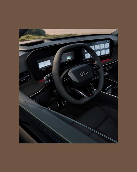 A high-fidelity interior perspective of a modern vehicle dashboard, emphasizing digital cockpit technology and premium steering wheel design.