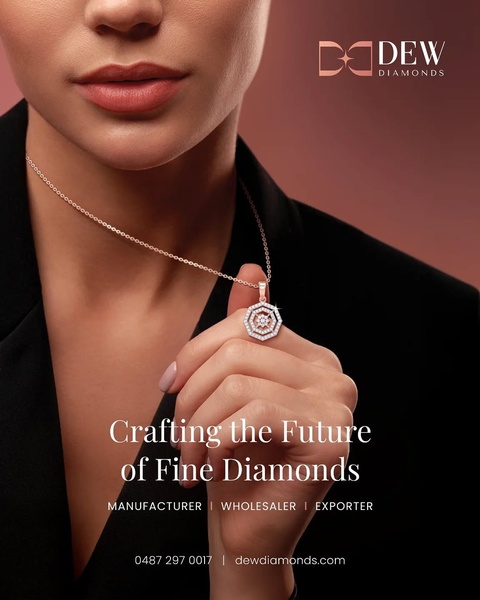 A close-up, high-fashion shot of a model wearing a delicate, geometric diamond necklace. The background is a muted, warm tone that keeps the focus entirely on the jewelry.