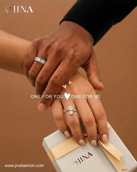 A close-up shot showing two people wearing rings, holding a gift box, symbolizing shared sentiment and connection.