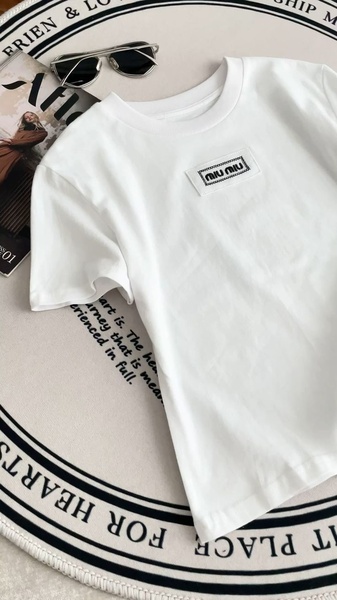 white t shirt, graphic tee, crew neck shirt, short sleeve top, cotton t shirt, new arrival, flat lay, calm, fresh, neutral