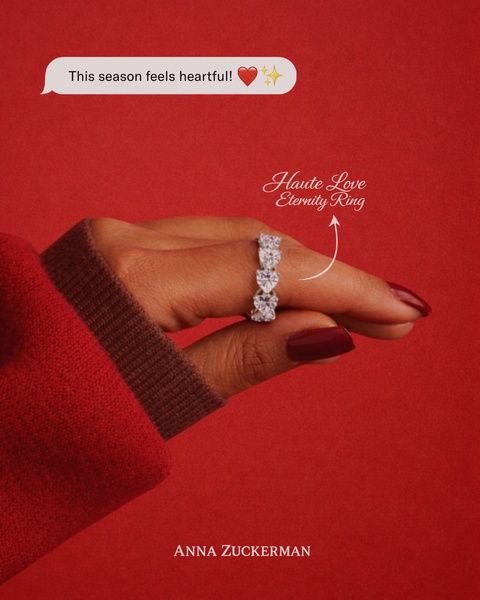 A close-up of a hand wearing a heart-shaped eternity ring against a bold red background, featuring a text-bubble hook.