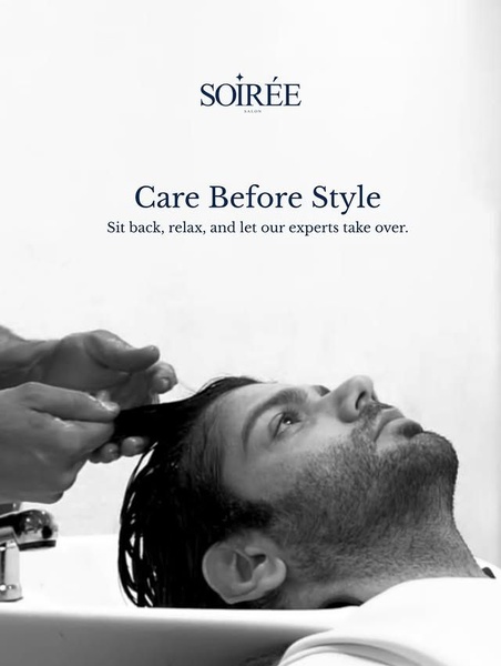 A sophisticated, high-contrast black and white ad for a salon service that highlights the luxury of being taken care of by professionals.