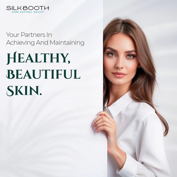 This ad creative uses a clean, high-end portrait of a model holding a white space frame to communicate skin health and brand reliability.