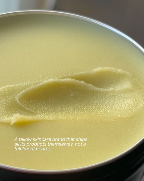 A close-up macro shot of tallow balm showing its rich texture with text highlighting the brand's in-house fulfillment model.