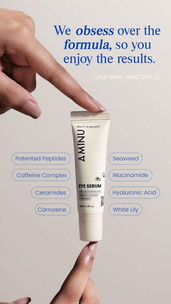 A close-up, high-key shot of a hand holding an eye serum tube, surrounded by floating ingredient callouts to build trust through formula transparency.