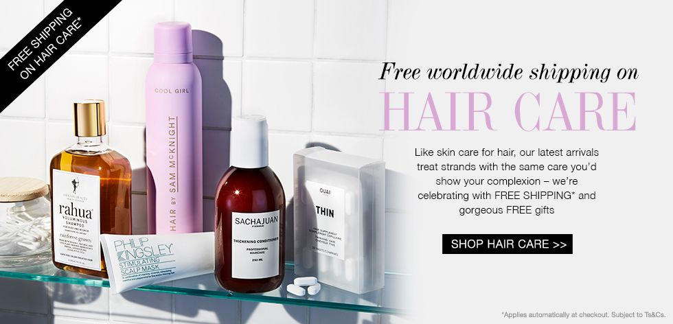 This ad creative features a collection of premium hair care bottles and supplements arranged on a clean bathroom shelf, highlighting a free worldwide shipping offer.