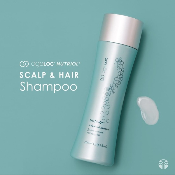 A clean, high-end product display for scalp and hair treatment, featuring a studio-quality shot and subtle branding on a calming teal background.