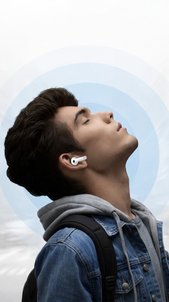 A close-up shot of a user wearing wireless earbuds, with concentric circular waves visually representing sound quality and focus.