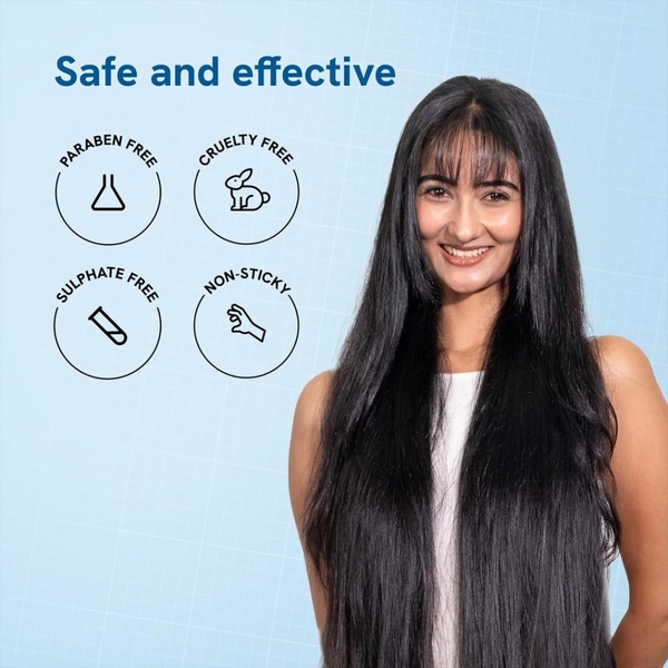 A clean, minimalist 1:1 square ad creative highlighting four key product safety benefits beside a model showcasing healthy hair.