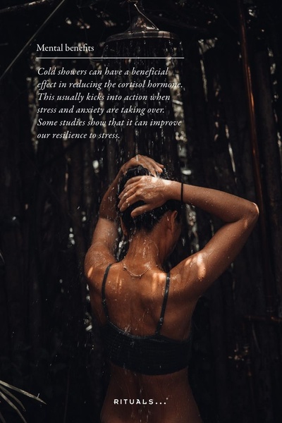A high-quality image of a person taking a shower, overlayed with educational copy explaining the physiological benefits of cold water therapy.