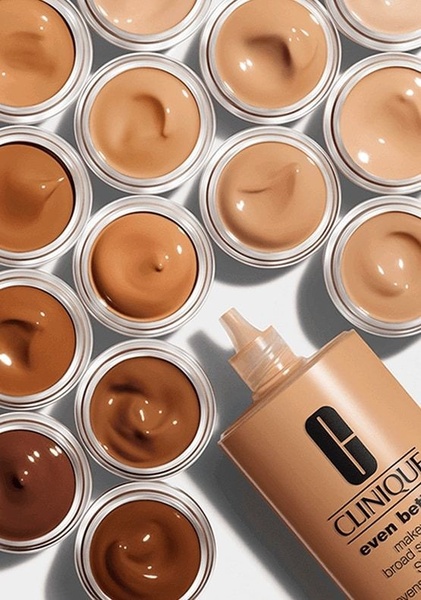 liquid foundation, face foundation, skin foundation, coverage foundation, makeup foundation, complexion makeup, product launch, brand awareness, flat lay, editorial, luxurious, bold, brown, neutral, orange