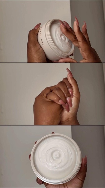 A close-up demonstration of a premium facial cream being scooped and applied, emphasizing the smooth, rich texture and high-quality consistency of the product.