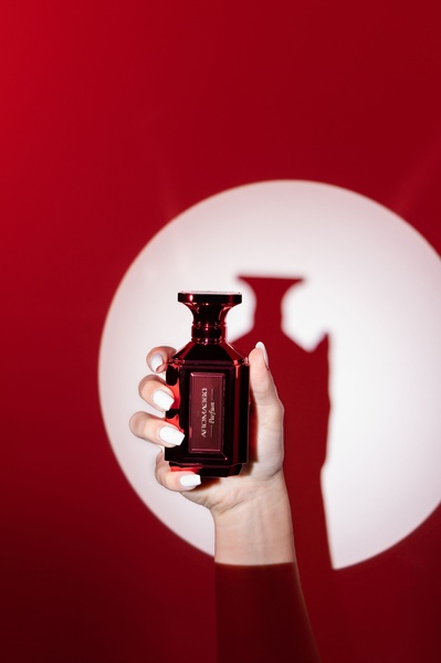 perfume, fragrance, scent, cologne, eau de parfum, brand awareness, minimalist, editorial, luxurious, bold, red, neutral