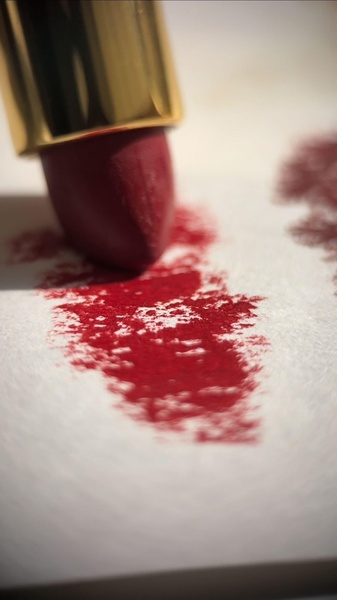 red lipstick, makeup, lipstick swatch, beauty product, cosmetic, product demo, minimalist, editorial, luxurious, calm, red, neutral, gold